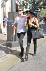 LUCY HALE and Adam Pitts at the Grove in West Hollywood