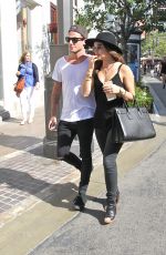 LUCY HALE and Adam Pitts at the Grove in West Hollywood