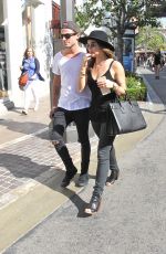LUCY HALE and Adam Pitts at the Grove in West Hollywood