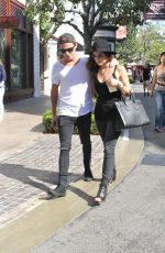 LUCY HALE and Adam Pitts at the Grove in West Hollywood