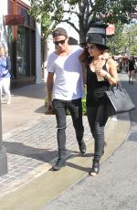 LUCY HALE and Adam Pitts at the Grove in West Hollywood
