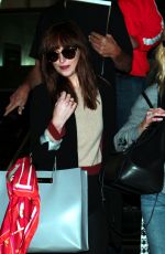 MELANIE GRIFFITH and DAKOTA JOHNSON at LAX Airport