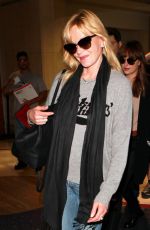 MELANIE GRIFFITH and DAKOTA JOHNSON at LAX Airport