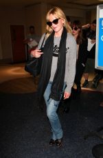 MELANIE GRIFFITH and DAKOTA JOHNSON at LAX Airport