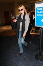 MELANIE GRIFFITH and DAKOTA JOHNSON at LAX Airport