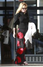 MELANIE GRIFFITH Shopping at Barney