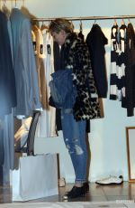 MILEY CYRUS Out Shopping in Buenos Aires