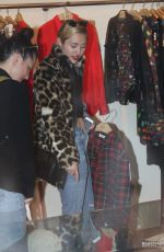MILEY CYRUS Out Shopping in Buenos Aires