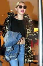 MILEY CYRUS Out Shopping in Buenos Aires