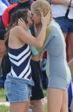 MINKA KELLY and RACHAEL TAYLOR Kissing on Set of Charlie