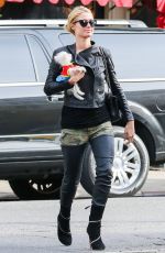 PARIS HILTON with Her Dog Waiting for a Cab in New York