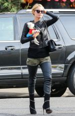 PARIS HILTON with Her Dog Waiting for a Cab in New York