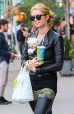 PARIS HILTON with Her Dog Waiting for a Cab in New York