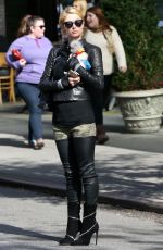 PARIS HILTON with Her Dog Waiting for a Cab in New York