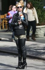 PARIS HILTON with Her Dog Waiting for a Cab in New York