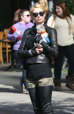 PARIS HILTON with Her Dog Waiting for a Cab in New York