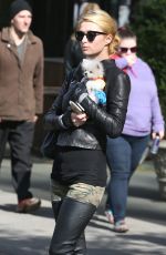 PARIS HILTON with Her Dog Waiting for a Cab in New York