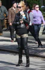 PARIS HILTON with Her Dog Waiting for a Cab in New York