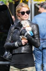 PARIS HILTON with Her Dog Waiting for a Cab in New York