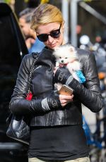 PARIS HILTON with Her Dog Waiting for a Cab in New York