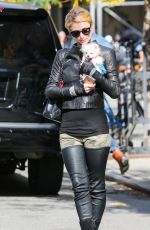 PARIS HILTON with Her Dog Waiting for a Cab in New York