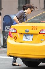 RACHEL WEISZ Hailing a Taxi Cab in New York