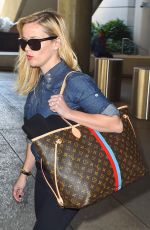 REESE WITHERSPOON Aarres on a Flight at LAX