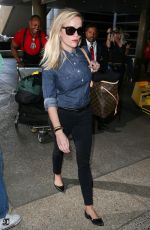 REESE WITHERSPOON Aarres on a Flight at LAX