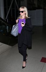 REESE WITHERSPOON Arrives at Los Angeles International Airport 3010
