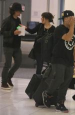 SELENA GOMEZ Arrives at Los Angeles Inernational Airport 2010
