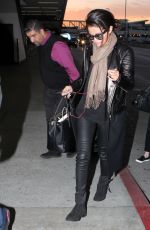 SELENA GOMEZ Arrives at Los Angeles Inernational Airport 2010