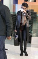 SELENA GOMEZ Arrives at Los Angeles Inernational Airport 2010