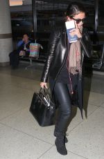 SELENA GOMEZ Arrives at Los Angeles Inernational Airport 2010