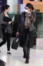 SELENA GOMEZ Arrives at Los Angeles Inernational Airport 2010