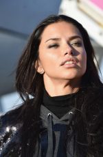 ADRIANA LIMA Departing for the London for 2014 Victoria