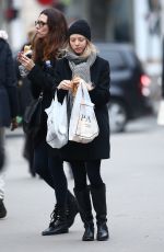 AMANDA SEYFRIED Out Shopping on the Champs-elysées Avenue in Paris