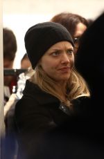 AMANDA SEYFRIED Out Shopping on the Champs-elysées Avenue in Paris