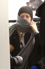AMANDA SEYFRIED Out Shopping on the Champs-elysées Avenue in Paris