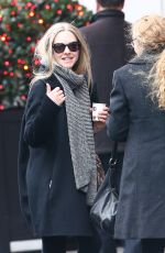 AMANDA SEYFRIED Out Shopping on the Champs-elysées Avenue in Paris