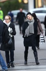 AMANDA SEYFRIED Out Shopping on the Champs-elysées Avenue in Paris