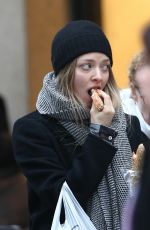 AMANDA SEYFRIED Out Shopping on the Champs-elysées Avenue in Paris