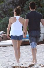 ASHLEY GREENE in Denim Shorts at a Beach in Cancun