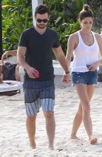 ASHLEY GREENE in Denim Shorts at a Beach in Cancun