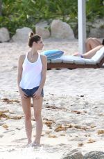 ASHLEY GREENE in Denim Shorts at a Beach in Cancun