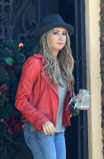ASHLEY TISDALE in Jeans at Her Home in Toluca Lake 2011