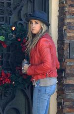 ASHLEY TISDALE in Jeans at Her Home in Toluca Lake 2011