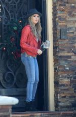 ASHLEY TISDALE in Jeans at Her Home in Toluca Lake 2011