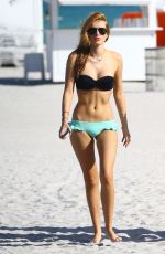 BELLA THORNE in Tiny Bikni on the Beach in Miami