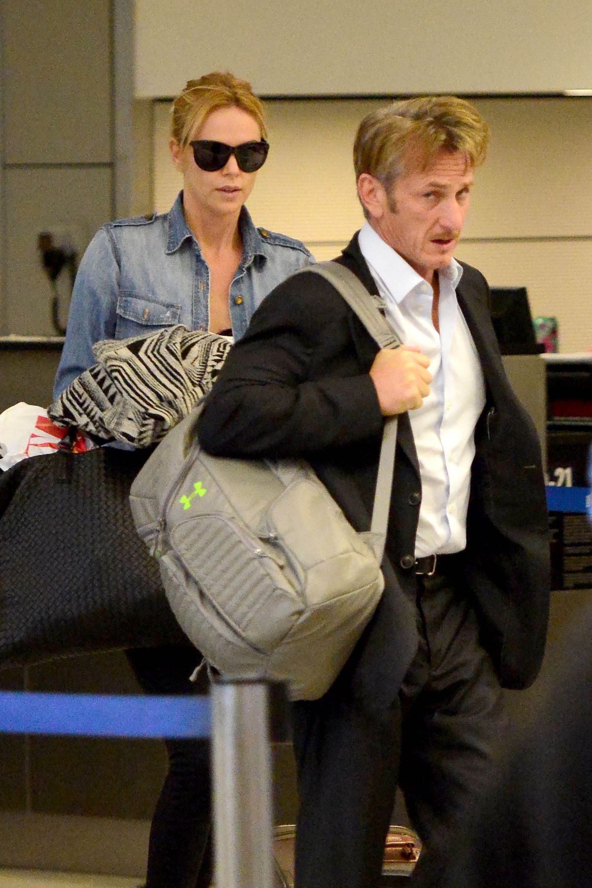 CHARLIZE THERON and Sean Penn Arrives at LAX Airport CHARLIZE THERON and Sean Penn Arrives at LAX Airport