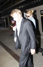 CHARLIZE THERON and Sean Penn Arrives at LAX Airport